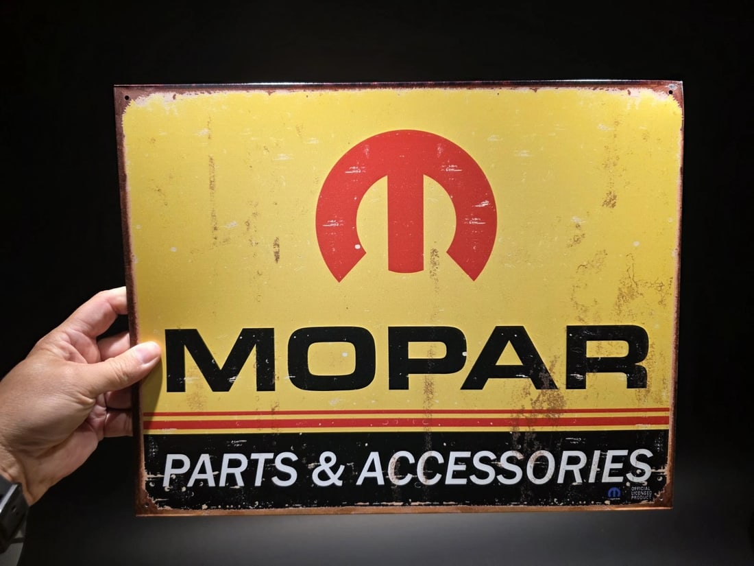 Mopar Auto Parts Sign: Title: Metal Vintage Style Mopar Auto Parts Sign Description: 16" x 12 1/2" Such a neat reproduction metal Mopar auto parts sign. Great decorative piece. Reserve: $15.00 Shipping: Domestic: Flat-