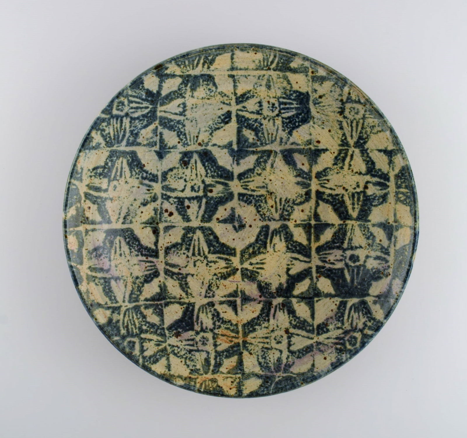 European studio ceramicist. Large unique bowl / dish in glazed stoneware with patterned decoration.: Title:European studio ceramicist. Large unique bowl / dish in glazed stoneware with patterned decoration. 1980s. Description:European studio ceramicist. Large unique bowl / dish in glazed stoneware wi