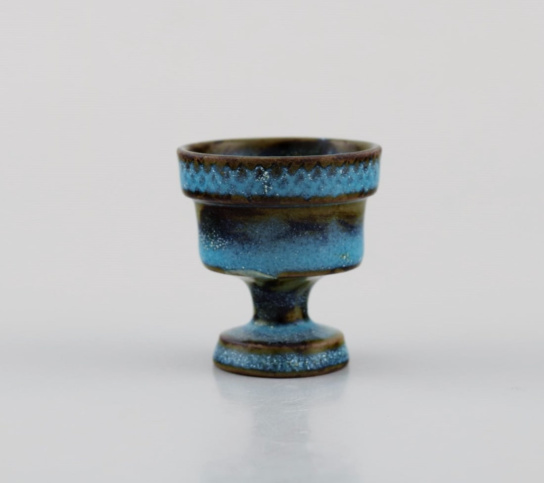 Stig Lindberg for Gustavsberg Studiohand. Miniature vase in glazed ceramics. Beautiful glaze in: Title:Stig Lindberg for Gustavsberg Studiohand. Miniature vase in glazed ceramics. Beautiful glaze in shades of blue. 1960s.Description:Stig Lindberg for Gustavsberg Studiohand. Miniature vase in