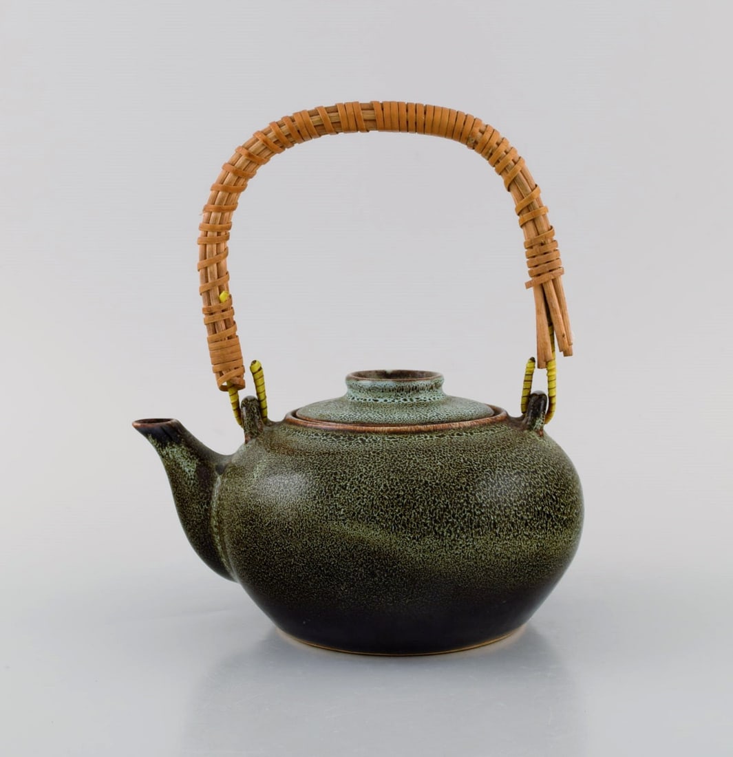 Chinese teapot in glazed stoneware with wicker handle. Beautiful speckled glaze in dark green and (1 of 6)