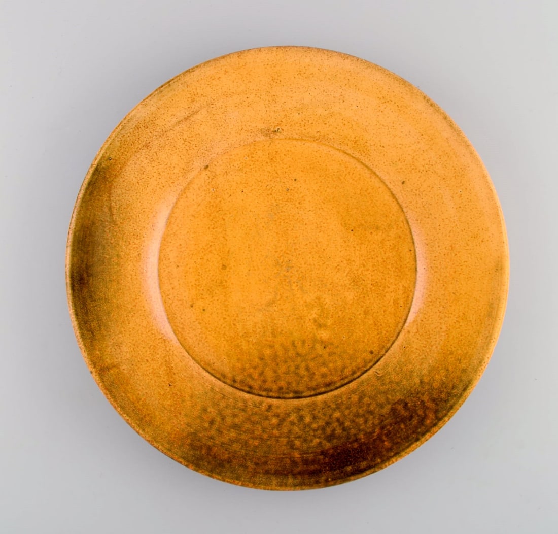 Svend Hammershøi for Kähler, Denmark. Large bowl / dish in glazed stoneware. Beautiful: Title:Svend Hammershøi for Kähler, Denmark. Large bowl / dish in glazed stoneware. Beautiful yellow uranium glaze. 1930s / 40s. Description:Svend Hammershøi for Kähler, Denmark. La