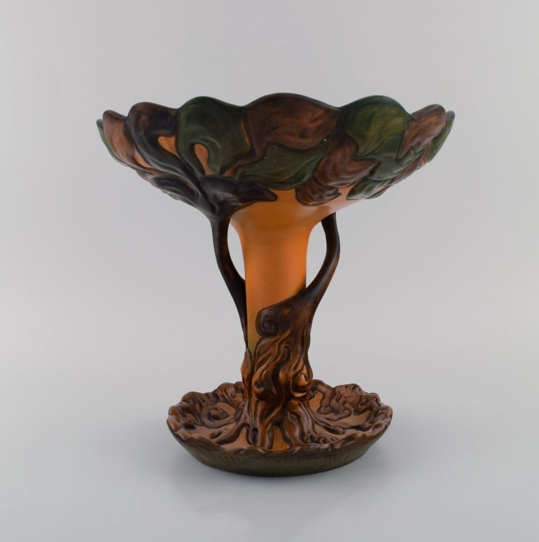 Ipsen's, Denmark. Large and rare art nouveau compote in glazed ceramics shaped like a tree. 1920s.: Title:Ipsen's, Denmark. Large and rare art nouveau compote in glazed ceramics shaped like a tree. 1920s. Model number 181.Description:Ipsen's, Denmark. Large and rare art nouveau compote in glazed