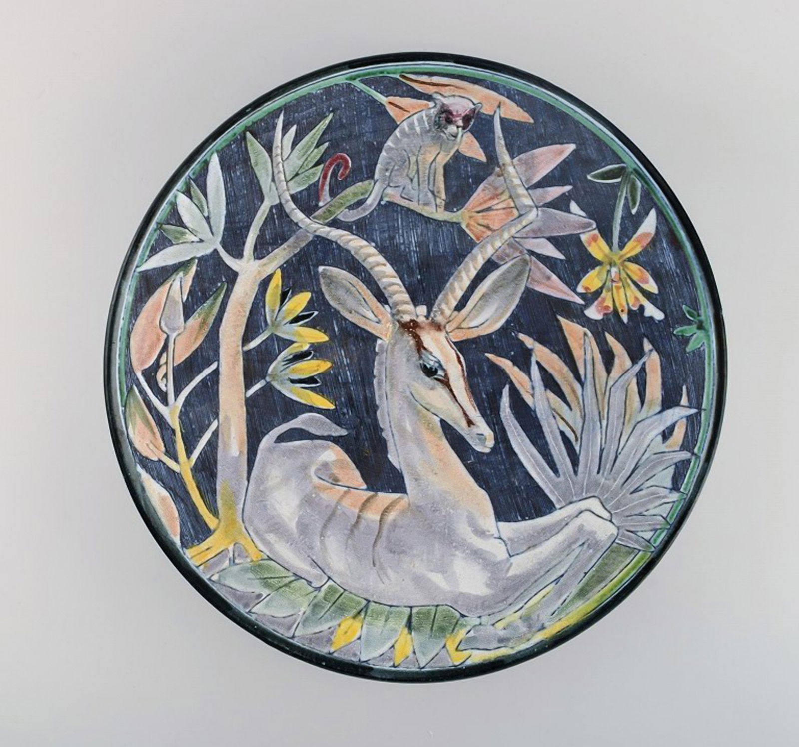 Tilgmans, Sweden. Large unique circular bowl / dish in glazed ceramics with antelope and monkey. (1 of 6)
