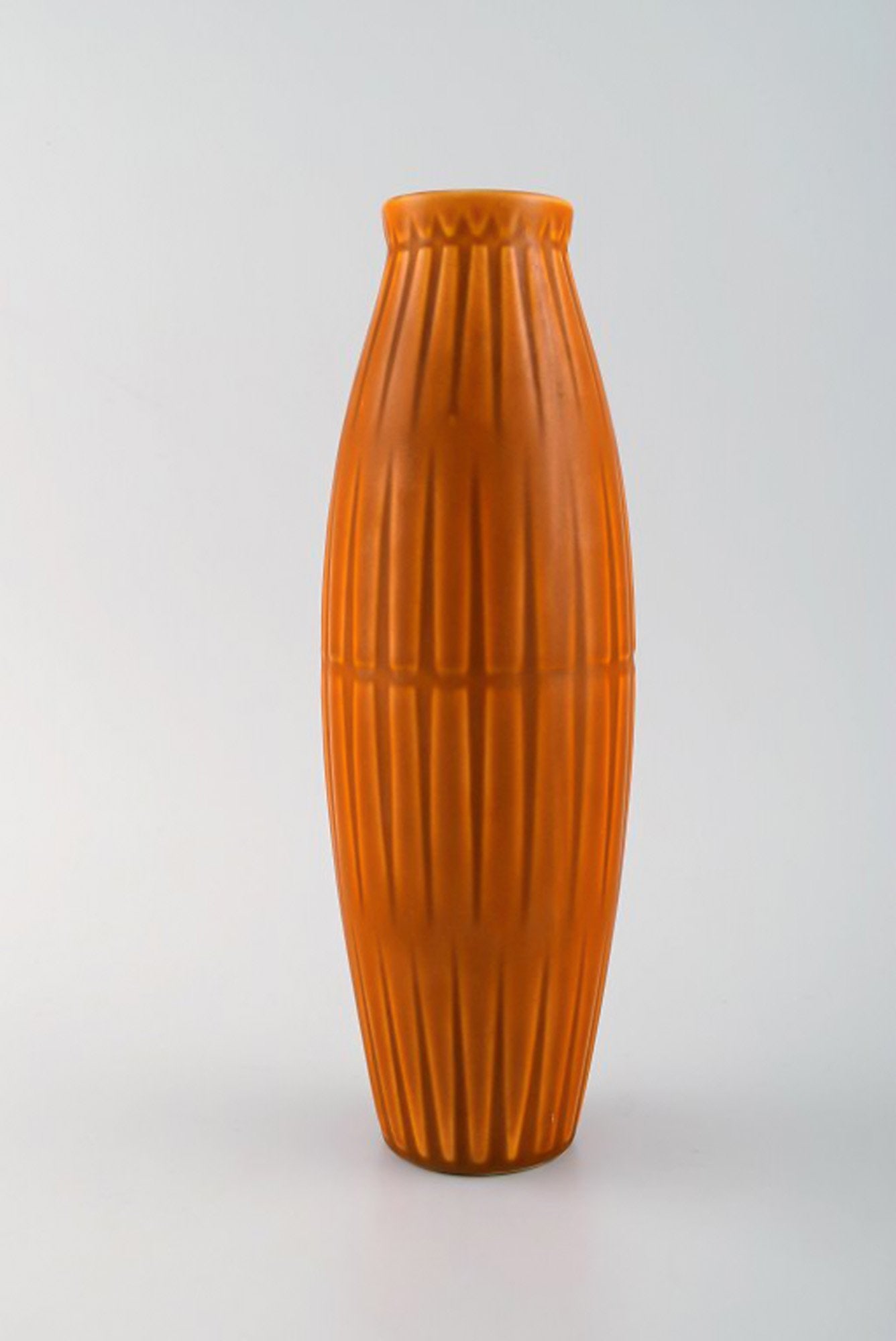 Bo fajans, Sweden. Vase in glazed ceramics with ribbed body. Beautiful glaze in dark orange shades.: Title:Bo fajans, Sweden. Vase in glazed ceramics with ribbed body. Beautiful glaze in dark orange shades. 1960 / 70s.Description:Bo fajans, Sweden. Vase in glazed ceramics with ribbed body. Beautiful