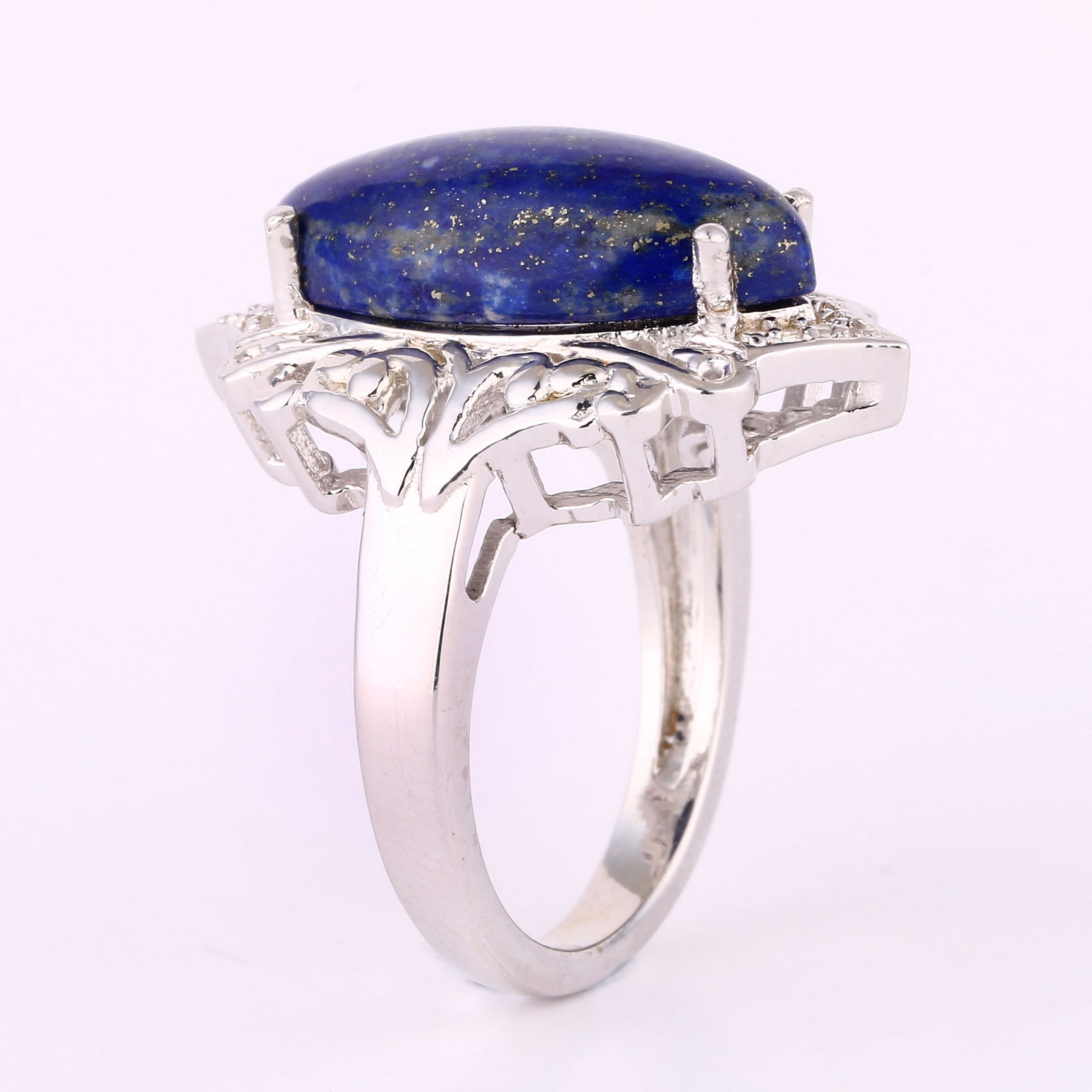 Ring: Lapis CAB Marquise 20x10mm: No Reserve! Title: Ring: Lapis CAB Marquise 20x10mm Description: Lapis CAB Marquise 20x10mm - 1Pc + White Topaz Round 1.20mm - 4Pcs + White Topaz Round 1.00mm - 10Pcs Date/Period: After 2000 Materials