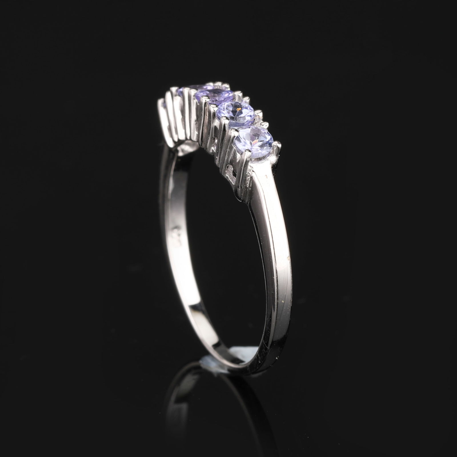 Ring: Tanzanite Round 2.50mm: No Reserve! Title: Ring: Tanzanite Round 2.50mm Description: Tanzanite Round 2.50mm - 5Pcs Date/Period: After 2000 Materials: 925 Silver W/Rhodium Gross Weight: 1.61 Gem Weight: 0.35 Dia Weight: Metal