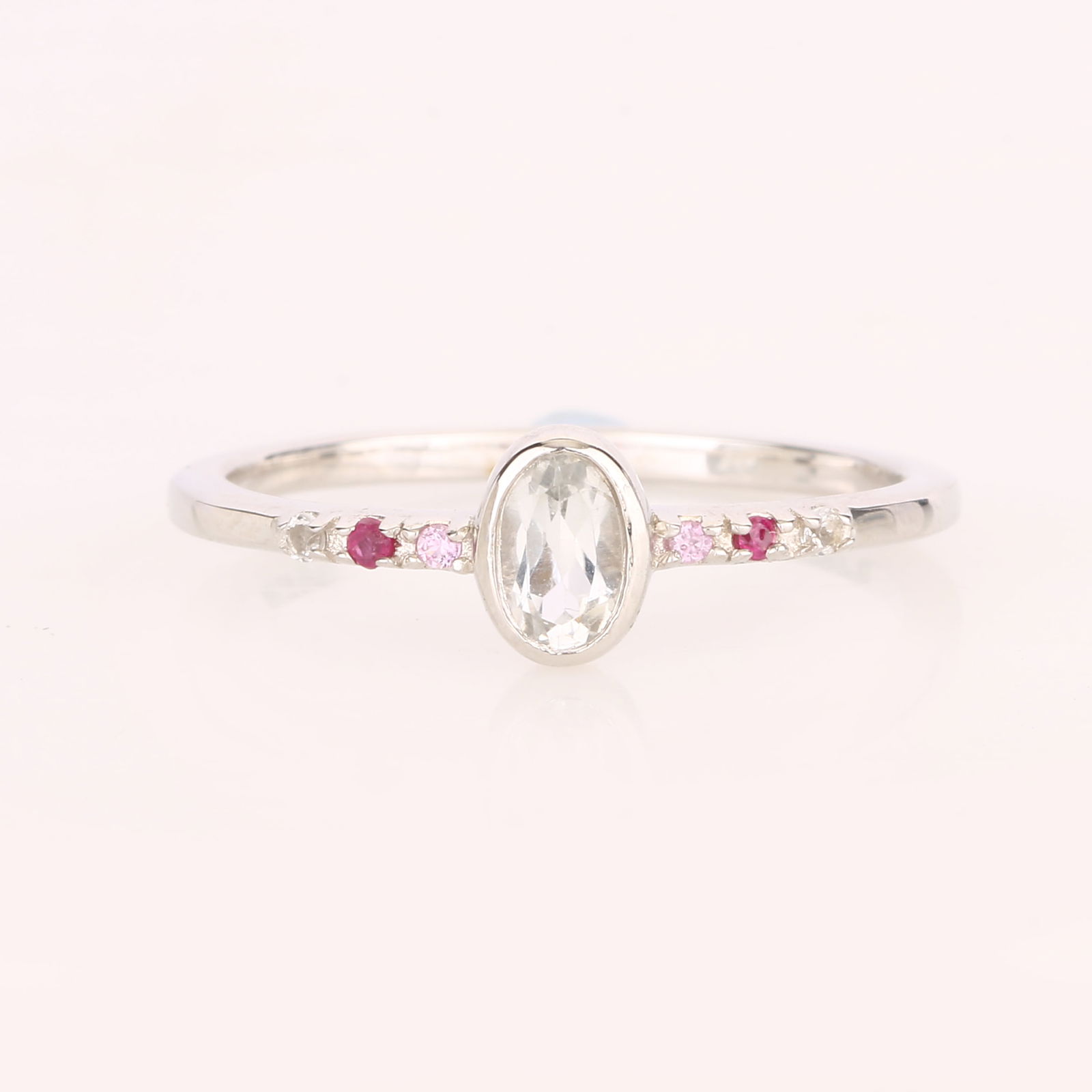 Ring: White Topaz Oval 5x3mm: No Reserve! Title: Ring: White Topaz Oval 5x3mm Description: White Topaz Oval 5x3mm - 1Pc + Pink Sapphire Diamond Cut Round 1.25mm - 2Pcs + Bkk Ruby Round 1.25mm - 2Pcs + White Topaz Round 1.25mm -