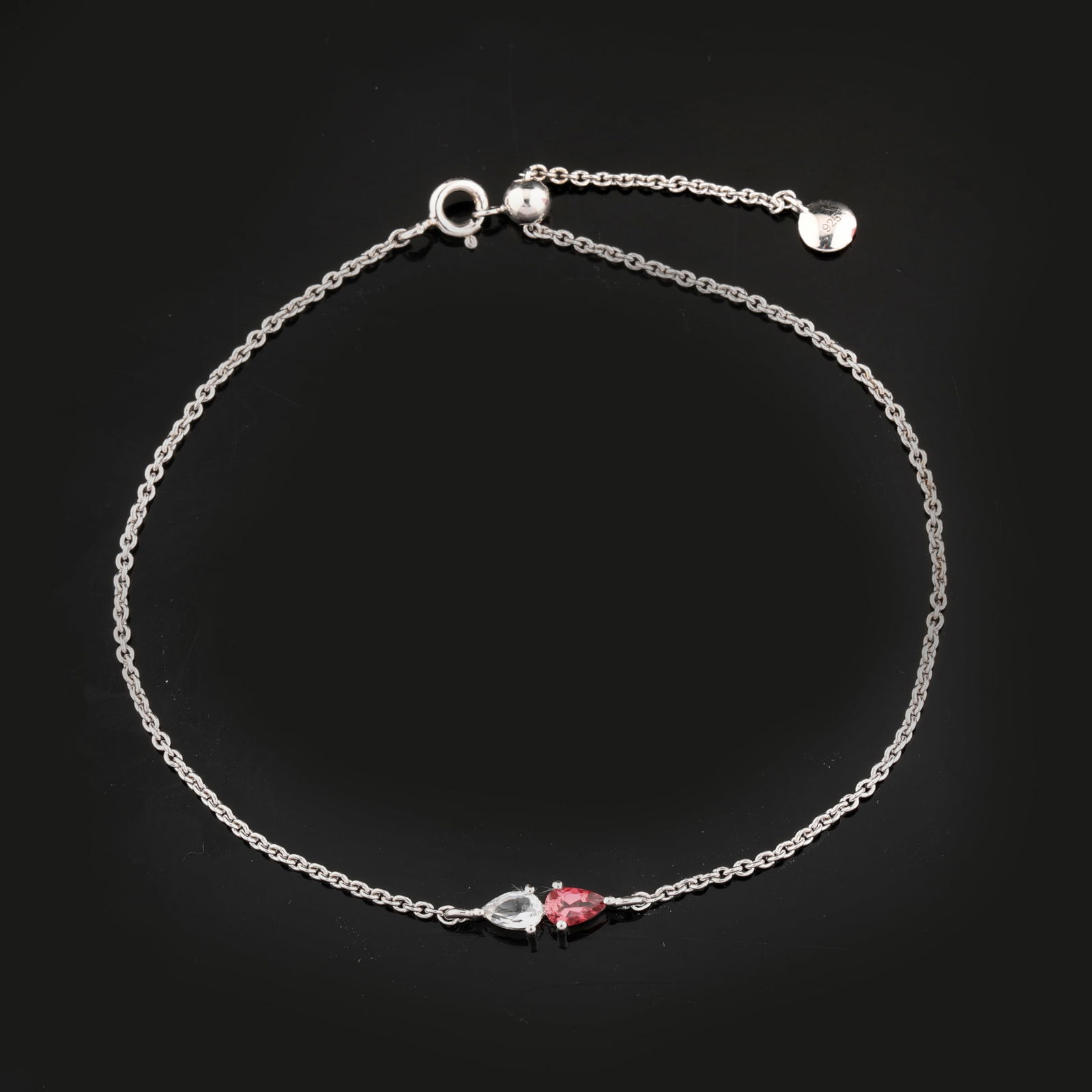Bracelet: Pink Tourmaline Pears 5x3mm: No Reserve! Title: Bracelet: Pink Tourmaline Pears 5x3mm Description: Pink Tourmaline Pears 5x3mm - 1Pc + White Topaz Pears 5x3mm - 1Pc ( Metal Weight With Chain ) CASTING FOR LOGO Date/Period: After