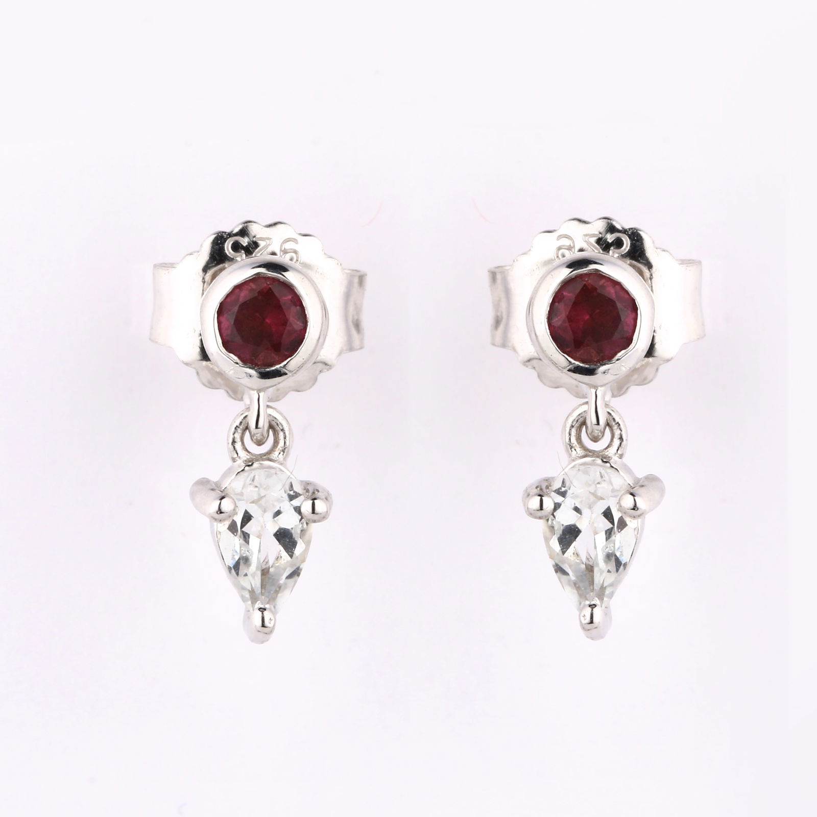 Earrings: White Topaz Pears 5x3mm: No Reserve! Title: Earrings: White Topaz Pears 5x3mm Description: White Topaz Pears 5x3mm - 1Pc + Pink Tourmaline Round 3.00mm - 1Pc Date/Period: After 2000 Materials: 925 Silver W/Rhodium Gross