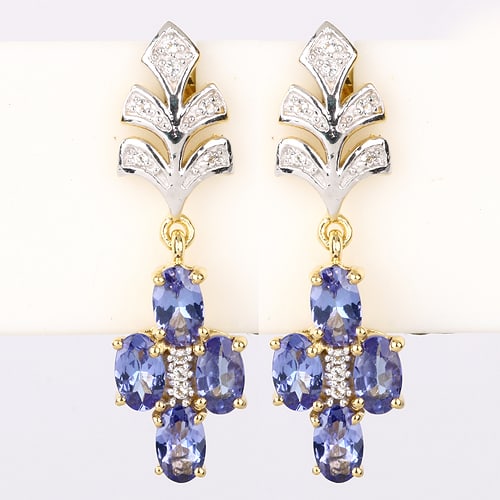 Earrings: Tanzanite Oval 5x3mm: No Reserve! Title: Earrings: Tanzanite Oval 5x3mm Description: Tanzanite Oval 5x3mm - 8Pcs + White Topaz Round 1.00mm - 18Pcs Date/Period: After 2000 Materials: 925 Silver W/Yellow Gold Plating Gross