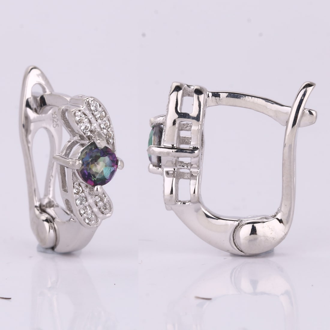 Earrings: Rainbow Topaz Round 4.00mm: No Reserve! Title: Earrings: Rainbow Topaz Round 4.00mm Description: Rainbow Topaz Round 4.00mm - 2Pcs + White Topaz Round 0.90mm - 24Pcs Date/Period: After 2000 Materials: 925 Silver W/Rhodium Gross