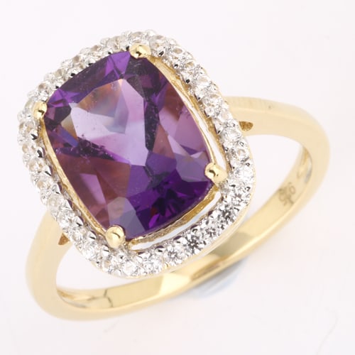 Ring: African Amethyst Cushion 11x8mm: No Reserve! Title: Ring: African Amethyst Cushion 11x8mm Description: African Amethyst Cushion 11x8mm - 1Pcs + White Zircon Round 1.20mm - 32Pcs Date/Period: After 2000 Materials: 925 Silver W/Yellow