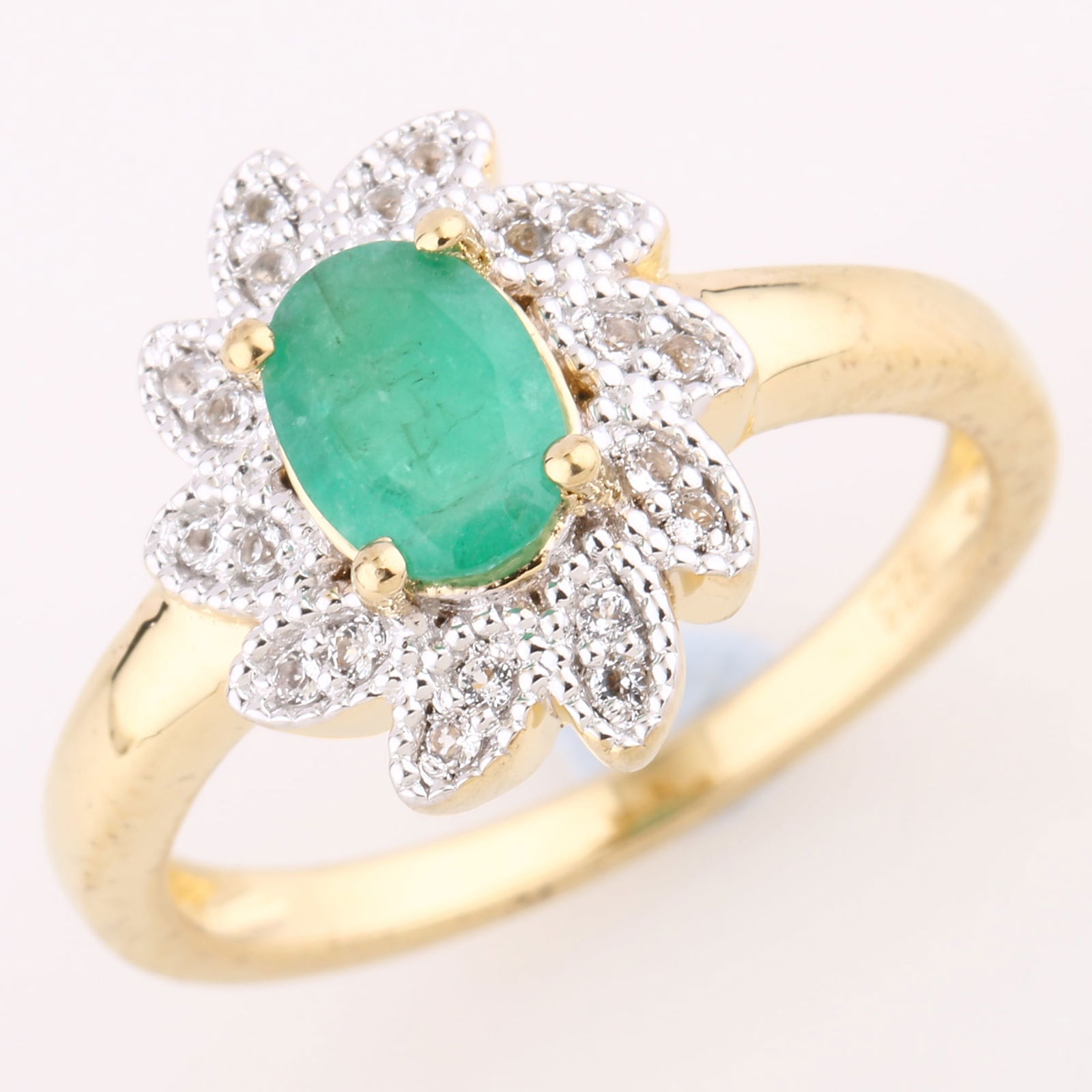 Ring: Sakota Emerald Oval 7x5mm: No Reserve! Title: Ring: Sakota Emerald Oval 7x5mm Description: Sakota Emerald Oval 7x5mm - 1Pc + White Topaz Round 1.00mm - 20Pcs Date/Period: After 2000 Materials: 925 Silver W/Yellow Gold Plating