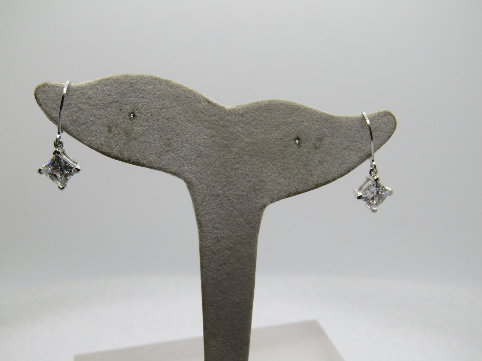 Sterling Square CZ Drop Earrings, Pierced Leverback, Signed JCM, DZ, 1990's: Sterling Square CZ Drop Earrings, Pierced Leverback, Signed JCM, DZ, 1990's, These are marked sterling and test as sterling with a weight of appx. 3.49 gr. The stones are set in a square basket