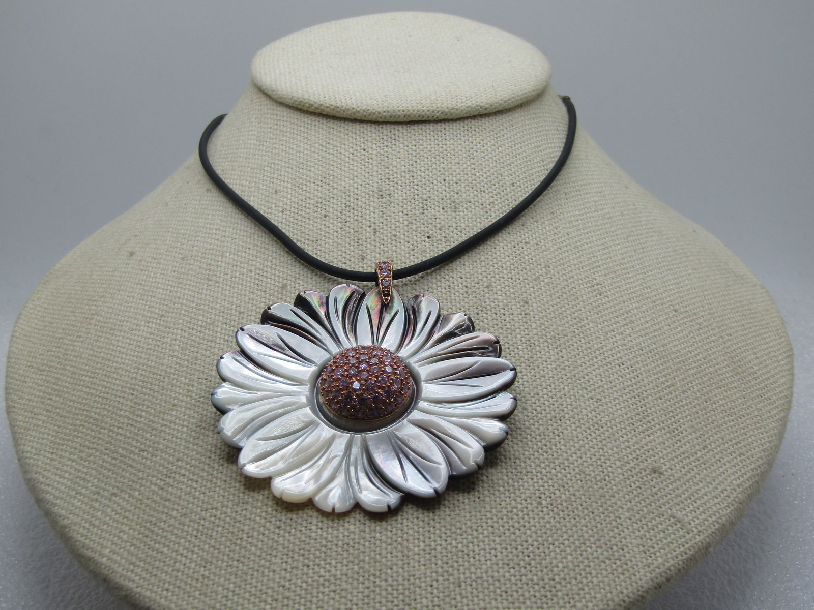 Vintage Carved Floral MOP Necklace, 18", Sterling Clasp, 1980's-1990's: Vintage Carved Floral MOP Necklace, 18", Sterling Clasp, 1980's-1990's. The pendant has a rose gold bail and raised center, both with pink CZ's set throughout the bail and center of the blossom. 