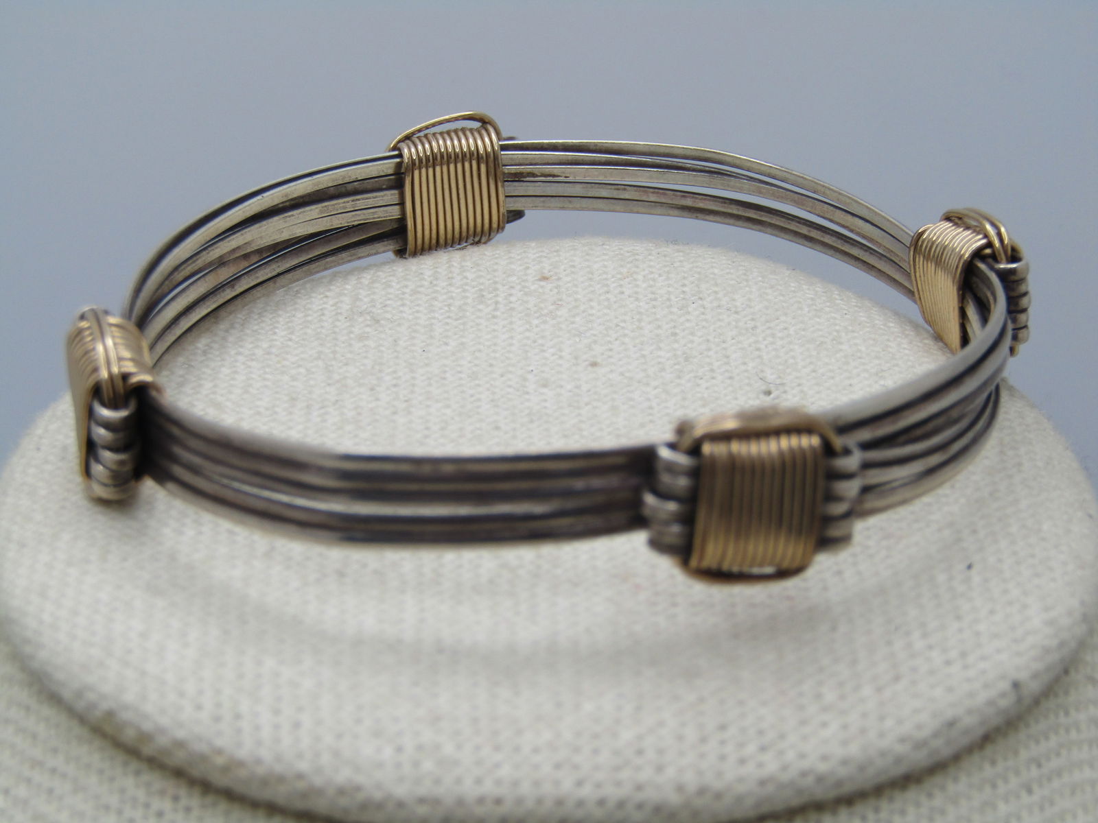 Vintage Sterling & 10KT G.F. Bracelet, 5 Bands, Slides to Adjust - Unisex: Vintage Sterling & 10KT G.F. Bracelet, 5 Bands, Slides to Adjust - Unisex. T his is hand made and made up of five sterling flat bands that slide through wrapped sterling and 10kt G.F. guides - there a