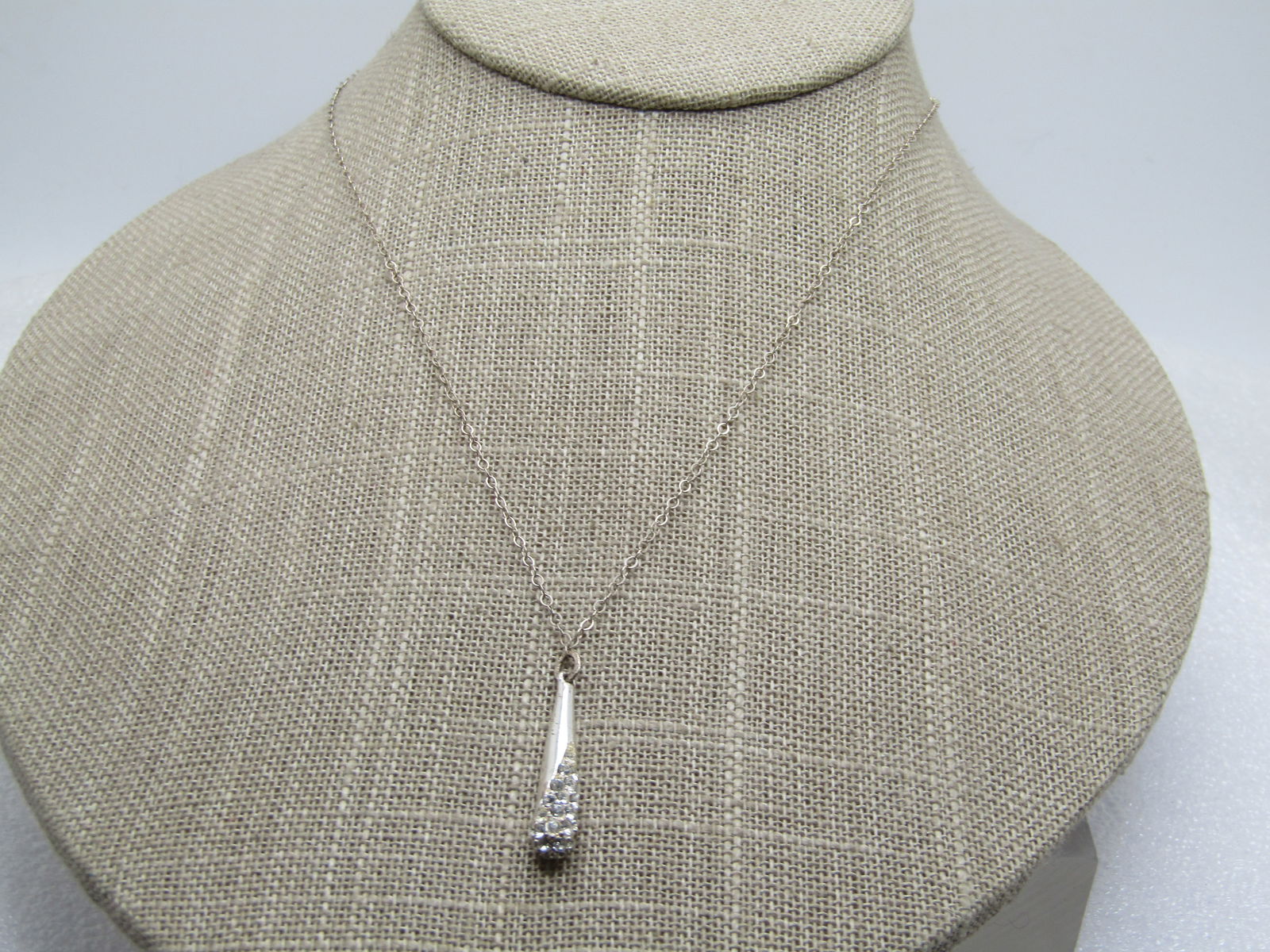 Vintage Sterling Rhinestone Teardrop Necklace, 16", 1970's-1980's: Vintage Sterling Rhinestone Teardrop Necklace, 16", 1970's-1980's. The chain is a 1mm slightly oval link that is appx. 16" with spring clasp. 00000000000It has a 1" elongated teardrop pendant that has