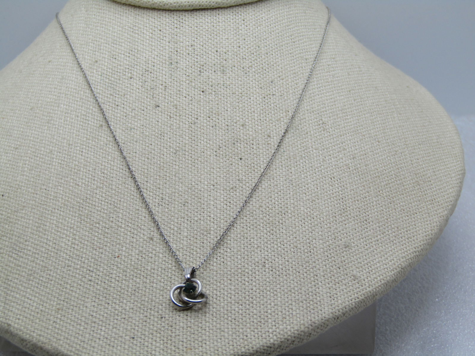 Vintage Sterling Love Knot Necklace, Green Rhinestone, 21", 1960's-1970's, Signed J. Felice. The: Vintage Sterling Love Knot Necklace, Green Rhinestone, 21", 1960's-1970's, Signed J. Felice Reserve: $30.00 Shipping:Domestic: Flat-rate of $6.00 to anywhere within the contiguous