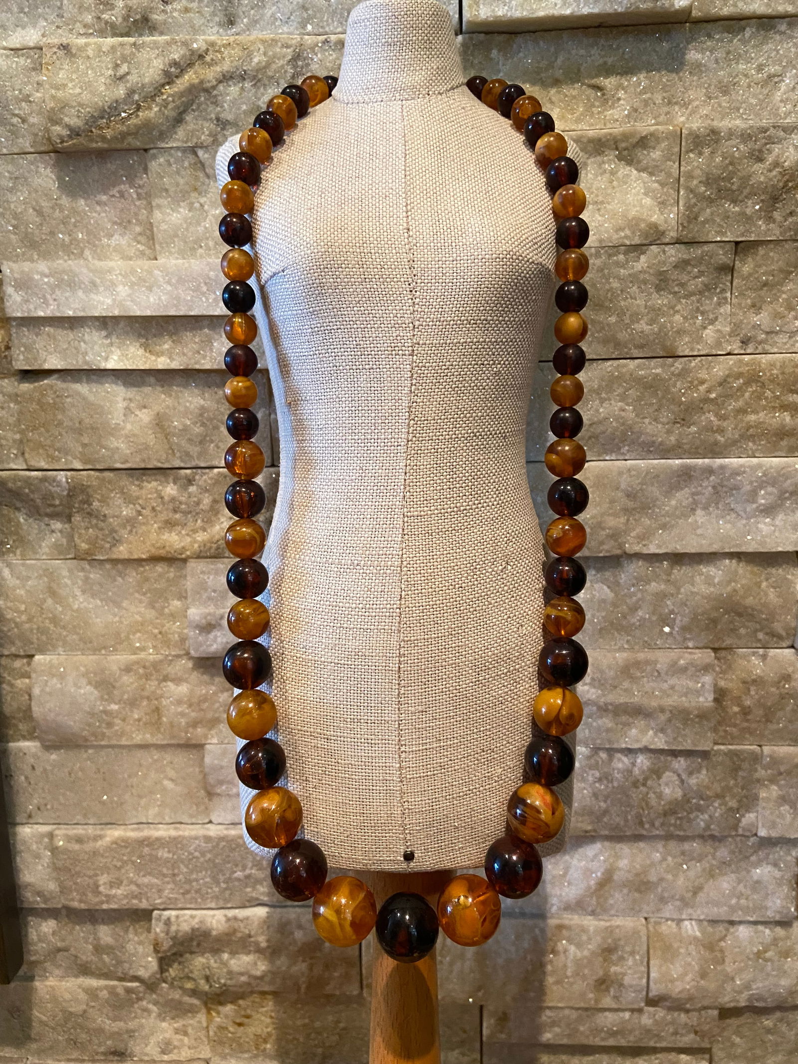 Bakelite Egg Yolk Amber and Baltic Amber Bicolor Beaded Statement Necklace: Title:Bakelite Egg Yolk Amber and Baltic Amber Bicolor Beaded Statement NecklaceDescription:Bakelite Egg Yolk Amber and Baltic Amber Bicolor Beaded Statement Necklace Bakelite refers to a type of