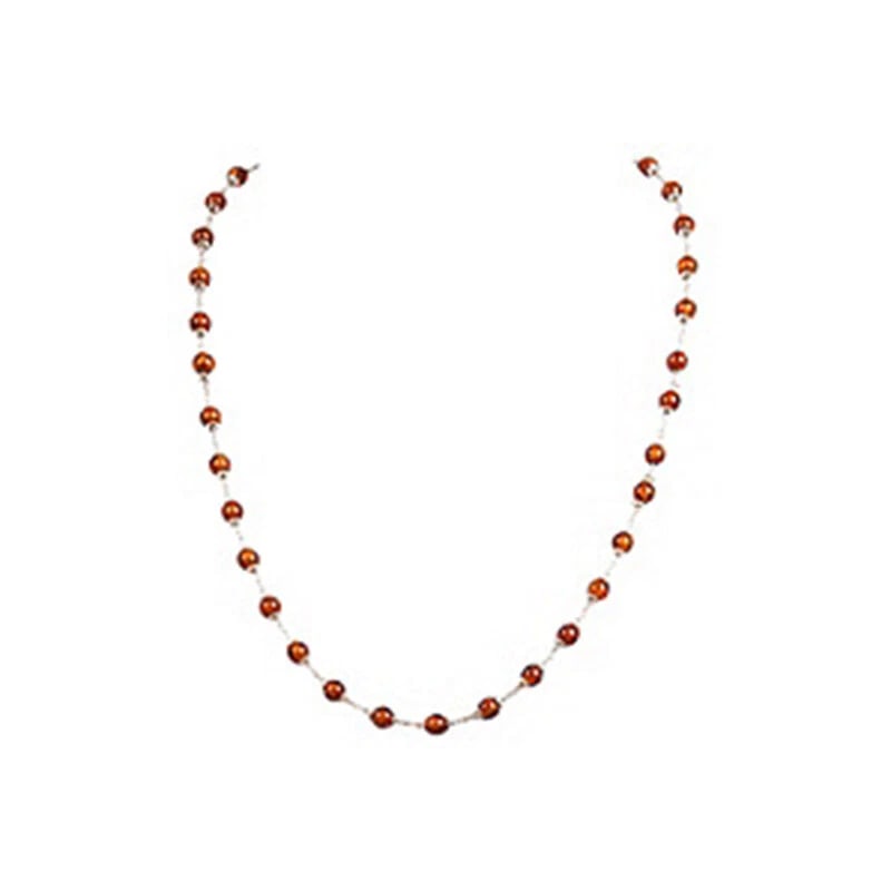 Sterling Silver Baltic Amber Necklace: Title:Sterling Silver Baltic Amber NecklaceDescription:1970's sterling silver necklace with 36 Baltic amber beads. Closes with lobster clasp and jump ring. Amber beads, 4.5 mm Dia each. Weight: 6.6