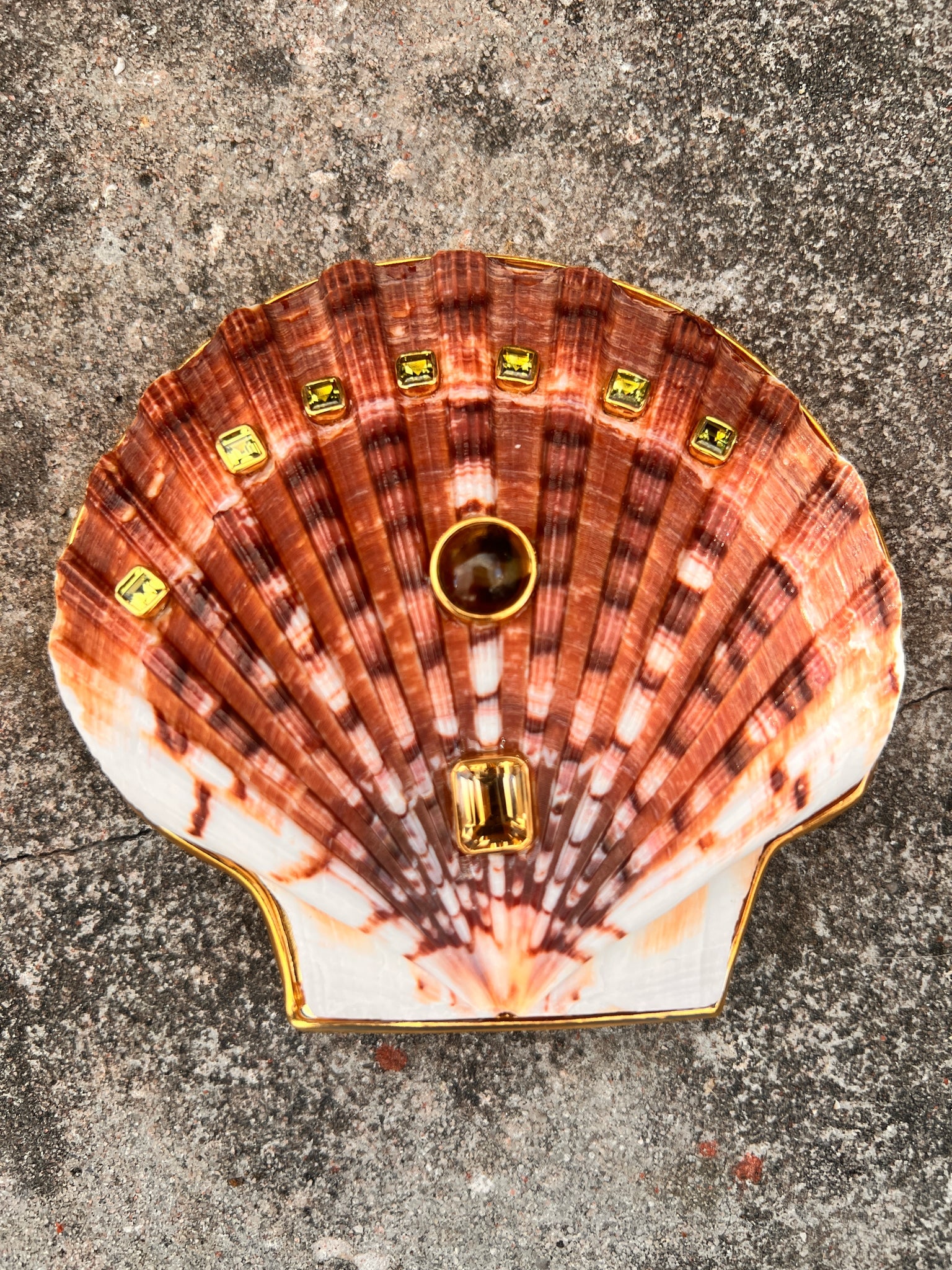 Flat Scallop Brooch with Peridots and Citrines: Title:Flat Scallop Brooch with Peridots and CitrinesDescription:Fabulous, large Irish Flat Scallop Brooch with unusual stripes and deep color. Nine Stones are set into this, including seven