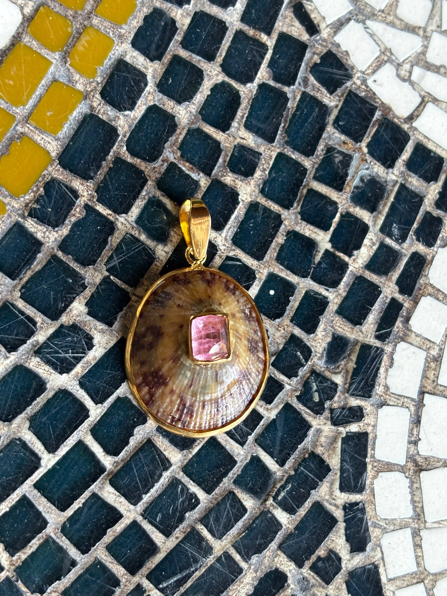 Limpet Shell Pendant with Pink Tourmaline: Title:Limpet Shell Pendant with Pink Tourmaline Description:Darling small Limpet Pendant set with MIner's-cut Pink Tourmaline - Signed CSS - Vermeil - 1.5" drop Reserve: $500.00 Shipping: Domestic: Sh