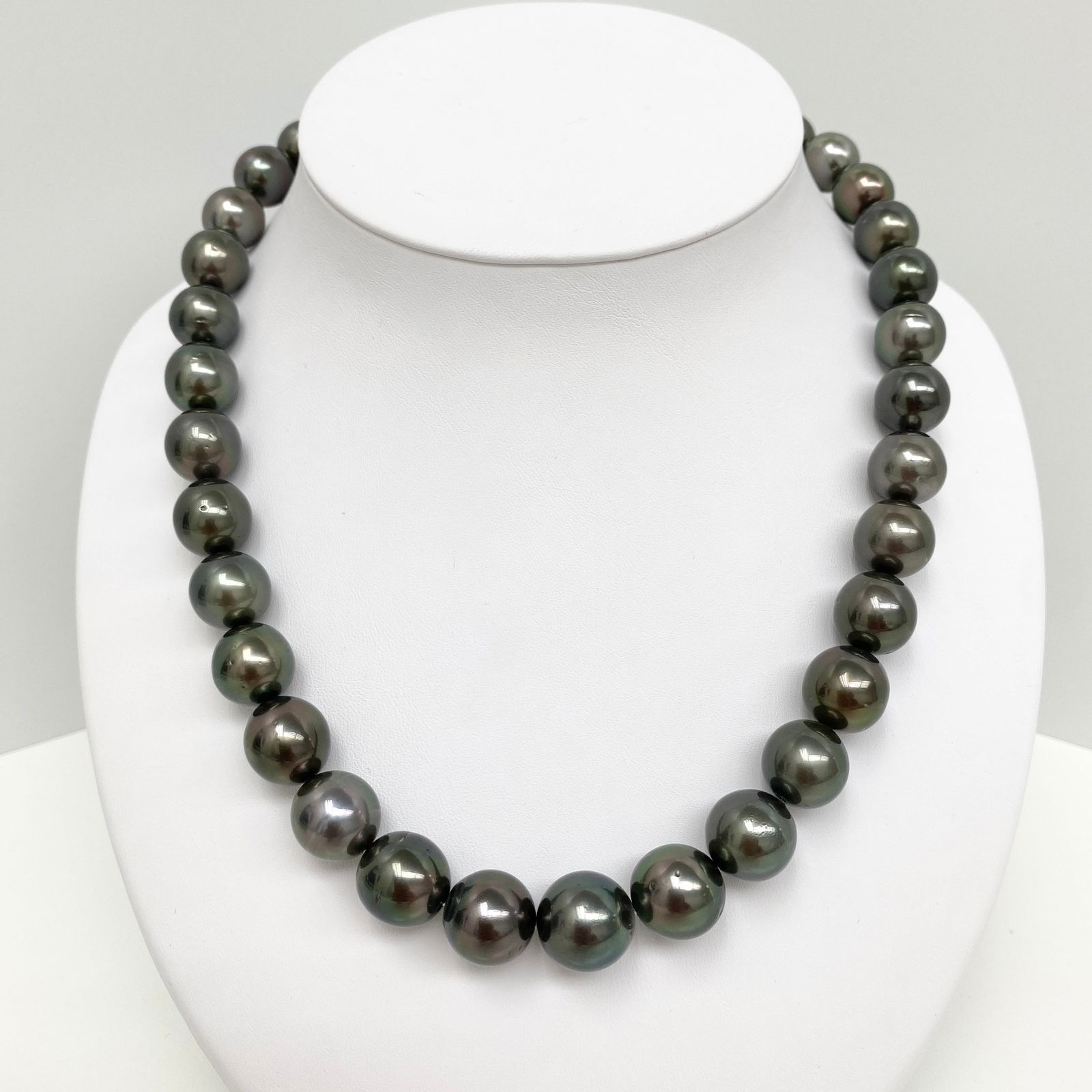 12-14mm Tahitian Dark Near-Round Pearl Necklace with 14k Clasp: Title:12-14mm Tahitian Dark Near-Round Pearl Necklace with 14k ClaspDescription:AAA Qualilty, Tahitian Dark Near-Round Pearl Necklace, 31 pearl pieces, 18 inches hand-knotted with 14k fish-hook