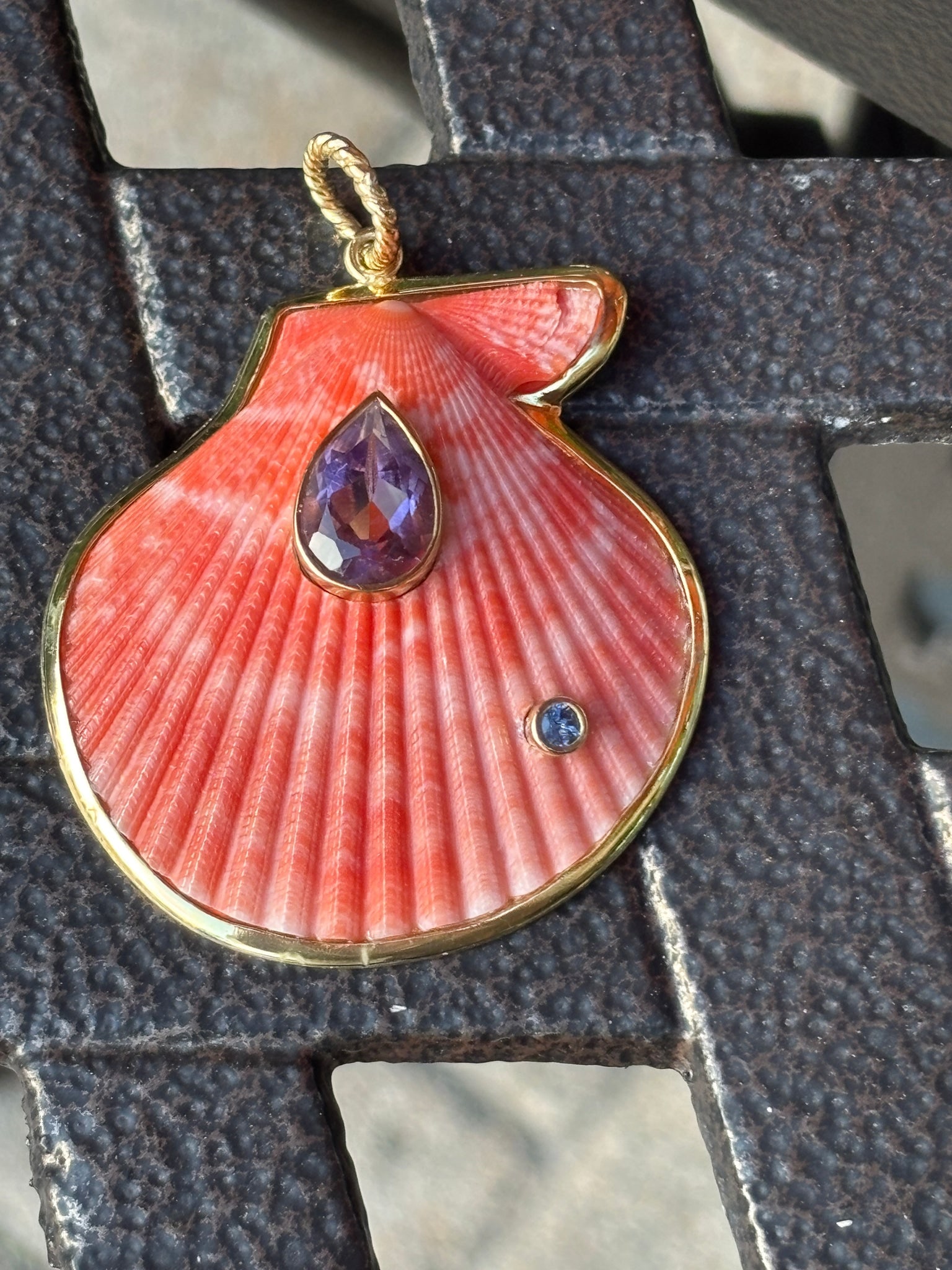 St. James Scallop Pendant with Amethyst & Tanzanite: Title:St. James Scallop Pendant with Amethyst & Tanzanite Description:Coral-colored Scallop Shell in this pretty St. James Pendant. It is set with a lavender Amethyst and a Tanzanite gemstones - Signe