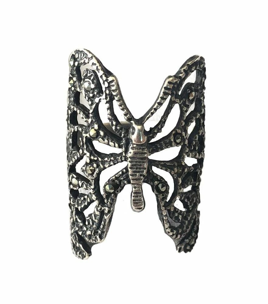 Pre Owned Mexican Sterling Silver Marcasite Butterfly Ring: Title:Pre Owned Mexican Sterling Silver Marcasite Butterfly RingDescription:Pre owned Mexican sterling silver butterfly filigree ring. Measurement from diameter: 20 mm Measurement from butterfly: