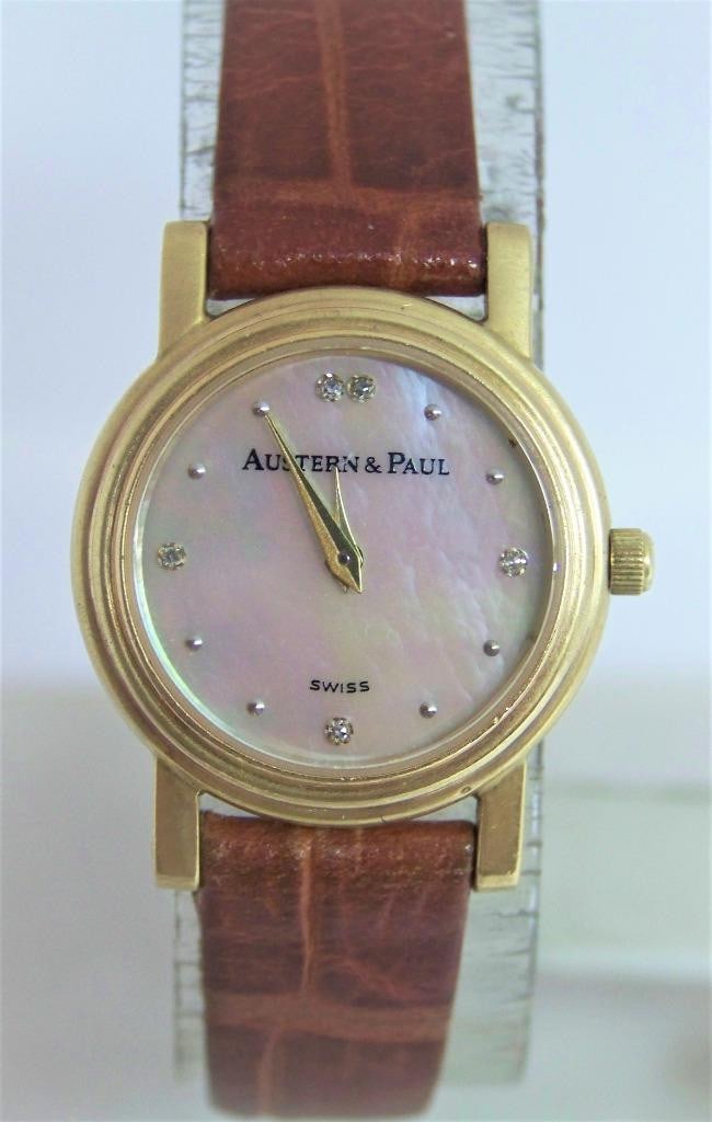 Solid 18k Ladies AUSTERN & PAUL Watch with Mother-of-Pearl Diamond Hour Markers: Solid 18k Ladies AUSTERN & PAUL Watch with Mother of Pearl Diamond Hour Markers​ This Ladies AUSTERN & PAUL​​ watch is Swiss made. Great present for yourself or someone you love! * S