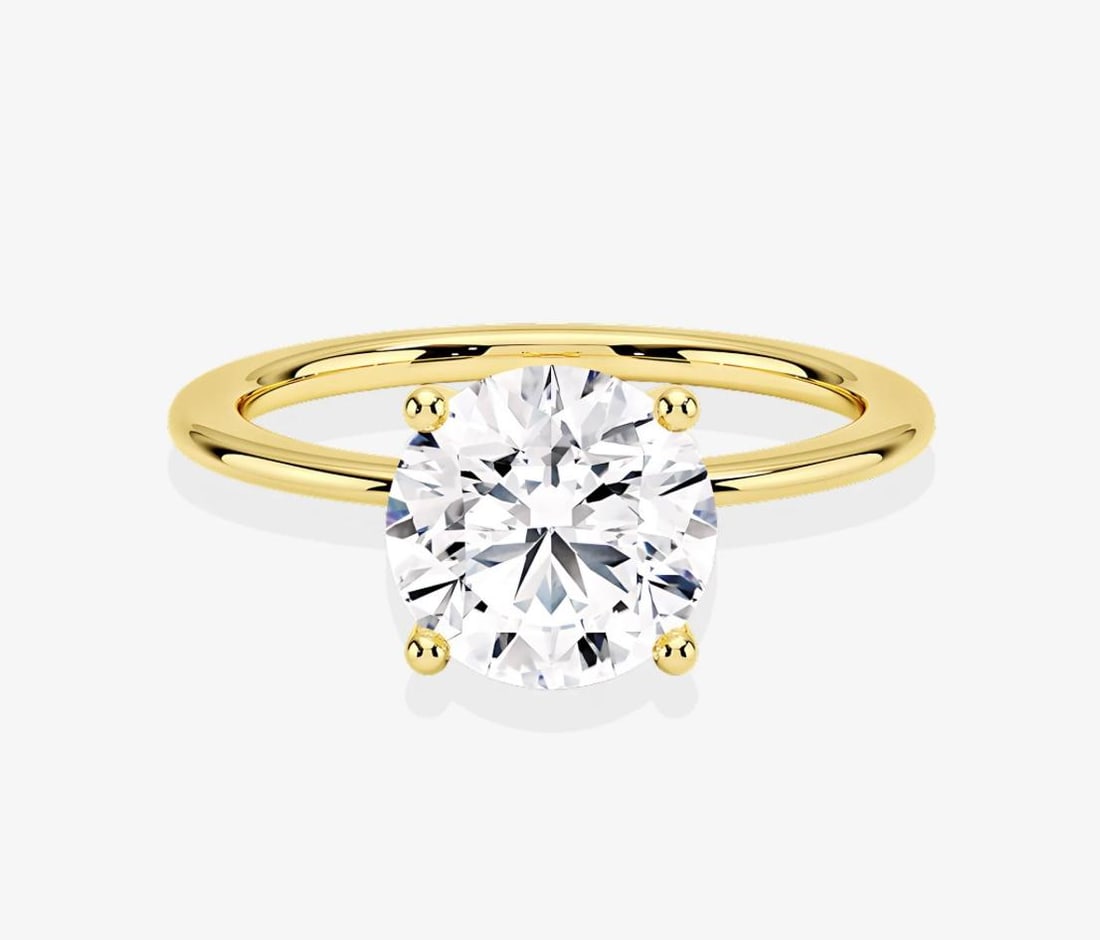 2 CT Round-Cut lab-grown diamond Diamond Solitaire Ring in 14K Yellow Gold (1 of 2)