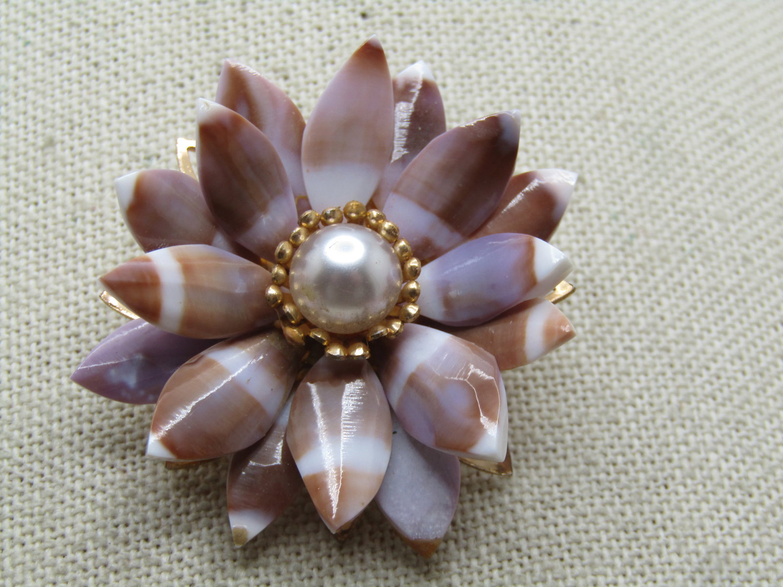 Vintage Tan/Lavender/White Blossom Brooch, Faux Pearl, 1960's-1970's: Vintage Tan/Lavender/White Blossom Brooch, Faux Pearl, 1960's-1970's. These are marquise shaped petals that have tan and white with lavender arranged in two tiers with a gold tone setting and open out