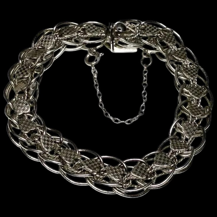 Vintage Trebor Sterling Silver Etched Heart Charm Bracelet with Safety Chain: Title: Vintage Trebor Sterling Silver Etched Heart Charm Bracelet with Safety Chain Description: Vintage Trebor Sterling Silver Etched Heart Charm Bracelet with Safety ChainHallmarked: Trebor Sterling