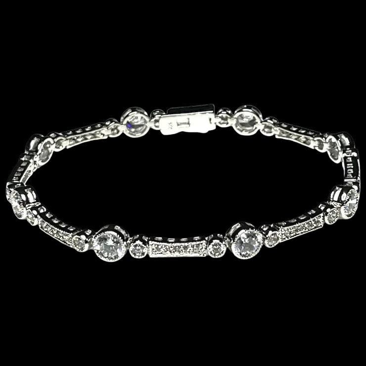 Estate Fancy Link CZ Tennis Bracelet: Title: Estate Fancy Link CZ Tennis Bracelet Description: Estate Fancy Link CZ Tennis BraceletHallmarked: 925Weighs: 10.4 gramsMeasures Approx: 7 inches length Estate Materials: Hallmarked: 925 Size: