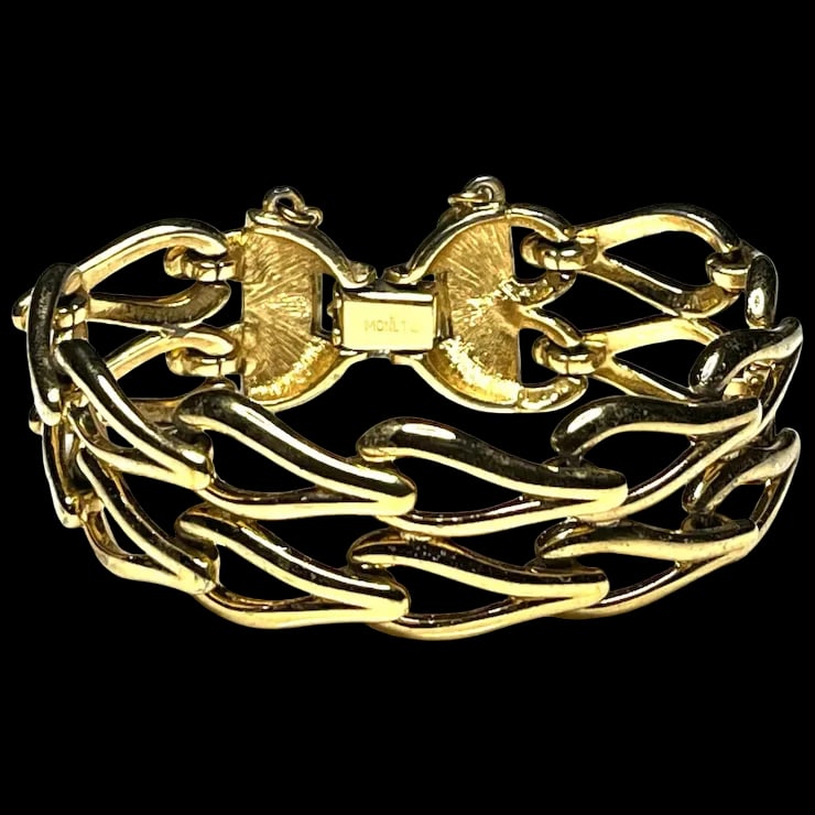 Vintage Monet Costume Jewelry Statement Bracelet with Safety Chain: Title: Vintage Monet Costume Jewelry Statement Bracelet with Safety Chain Description: Vintage Monet Costume Jewelry Statement Bracelet with Safety Chain Hallmarked: MonetWeighs: 42.5 gramsMeasures Ap