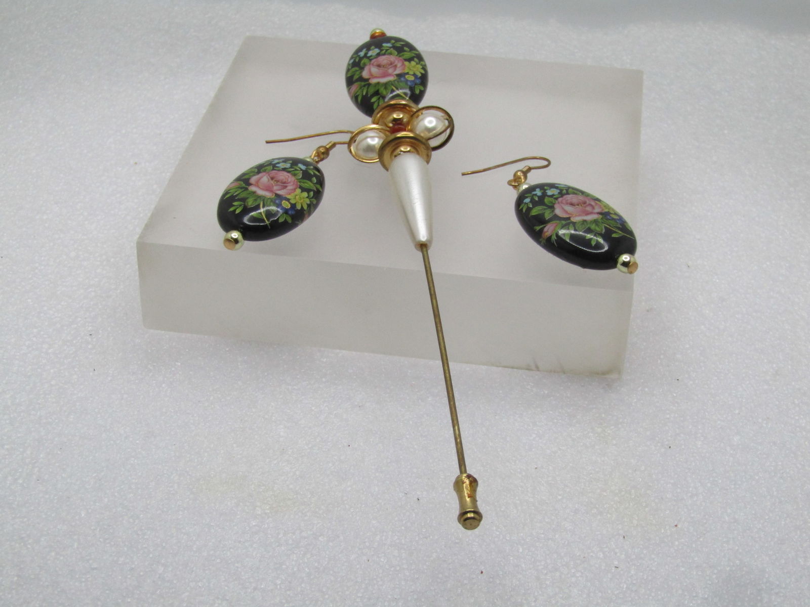 Vintage Pink Rose Hat Pin & Pierced Earrings, Dangle, 1980's: Vintage Pink Rose Hat Pin & Pierced Earrings, Dangle, 1980's. Black long oval beads and two-sided with the same image of a pink rose with gold finish details on the rose and stem and leaves in