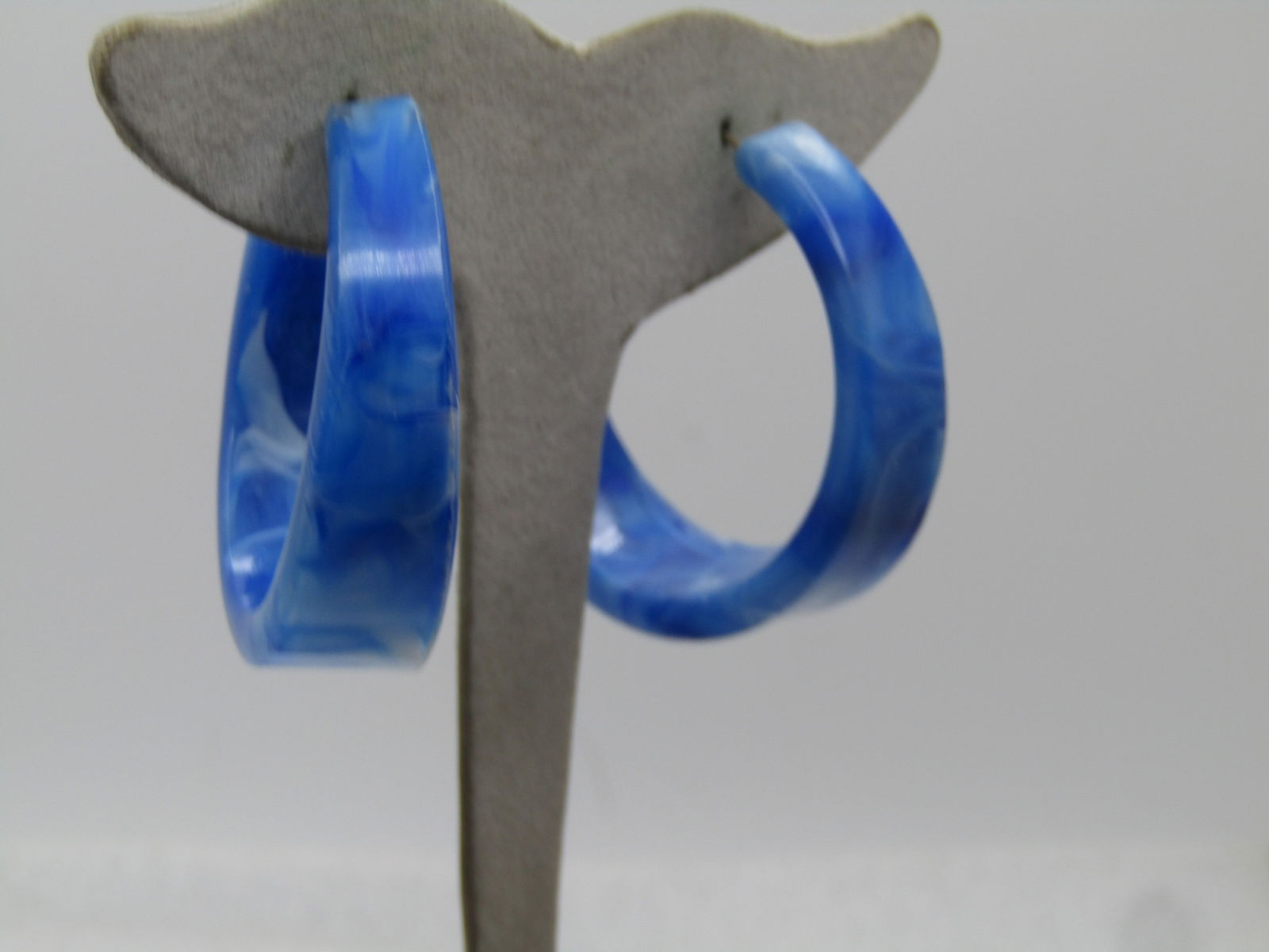 Vintage Blue Hoop Earrings, Pierced, 1960's, Hippie: Vintage Blue Hoop Earrings, Pierced, 1960's - swirled blue and white plastic hoop earings. They are appx.1.75" and 7mm at the post and 13mm at bottom center and 8mm at the back end of the hoop. Very 1