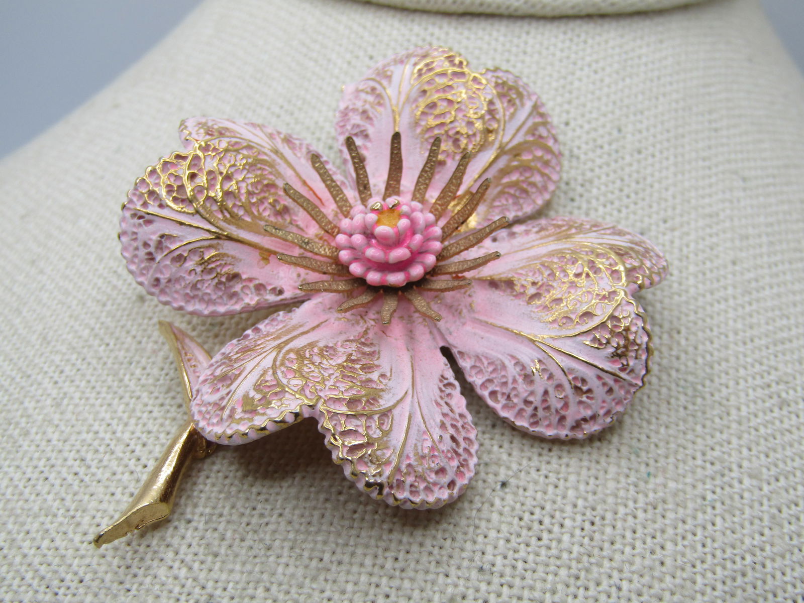 Vintage Pink & Gold Enameled Dogwood Blossom Brooch, Signed Art, 1950's-1960's: Vintage Pink & Gold Enameled Dogwood Blossom Brooch, Signed Art, ART Arthur Pepperr Pink Enamel Dogwood Flower Brooch Pin. It is appx. 2.25" by 2". Enameled in pink with gold tone accenting on the pet