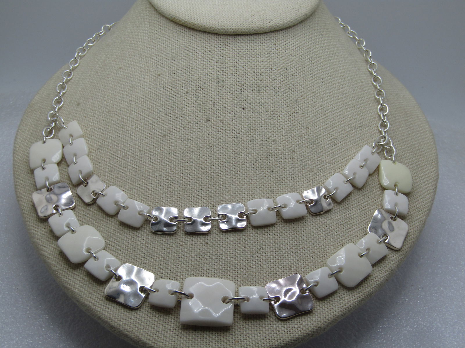 Vintage Swarovski White & Silver Necklace, 19", Double Strand Front, Swarovski, 1990's-2000's: Vintage Swarovski White & Silver Necklace, 19", Double Strand Front, Swarovski, 1990's. It has hammered silver tone tiles that are appx. 1/3" square and 1/4" square with whited faceted acrylic tiles
