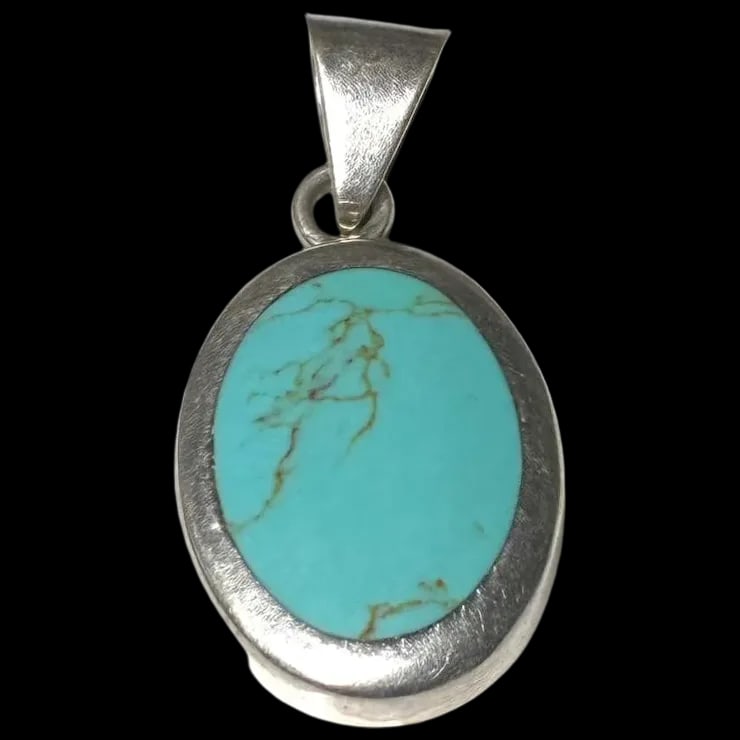 Vintage Sterling Silver Turquoise Pendant: Title: Vintage Sterling Silver Turquoise Pendant Description: Vintage Sterling Silver Turquoise Pendant Hallmarked: Mexico 925Weighs: 12 gramsMeasures: 2 x 1 inch Date/Period: Vintage Materials: Hallm