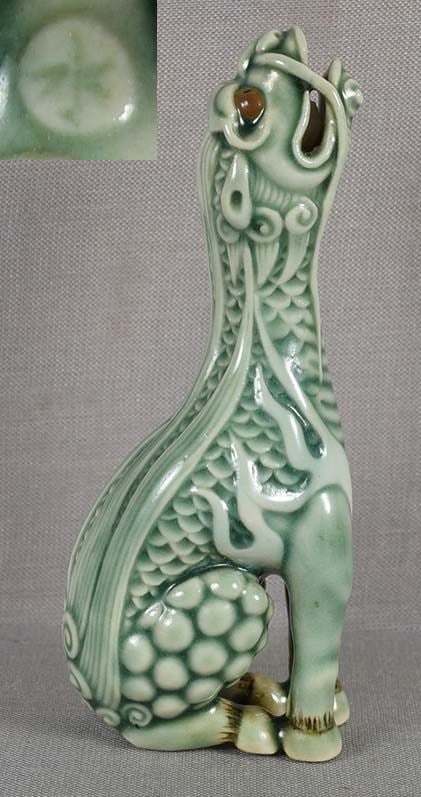 Porcelain netsuke BAYING KIRIN by ARMIN MULLER 8.2cm: Rare good size porcelain netsuke of a baying kirin with a free rolling ball in its mouth. Made by Armin Muller (American, 1932-2000), the artist is listed in “Netsuke: The H.I.H. Prince