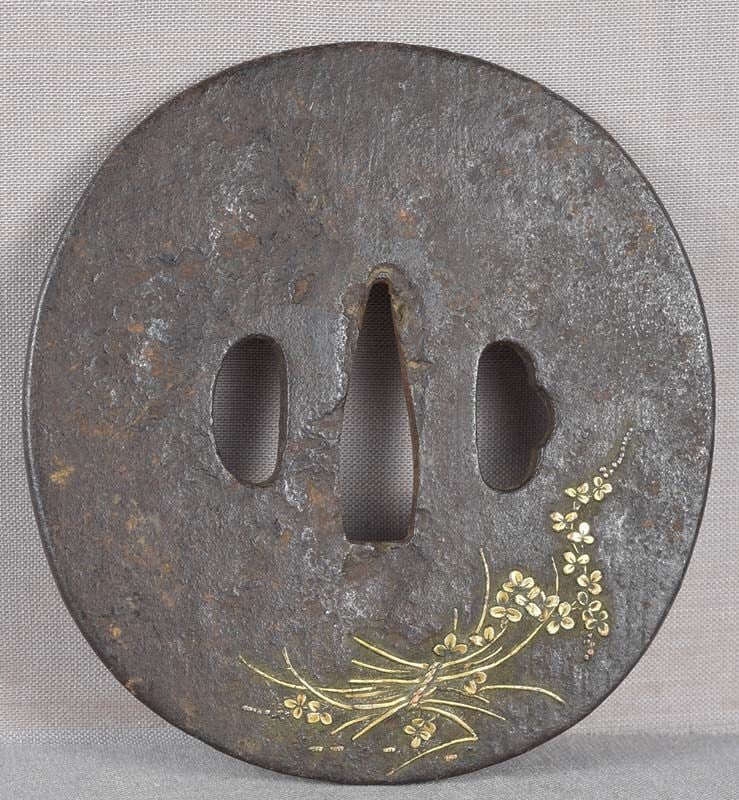 18c Japanese sword TSUBA grasses & flower: 18th century Japanese sword iron tsuba inlaid on the front with gilded copper bunch of flowers and grasses, the back inlaid with a sickle. Elegant piece in Japanese taste, superb quality inlay with