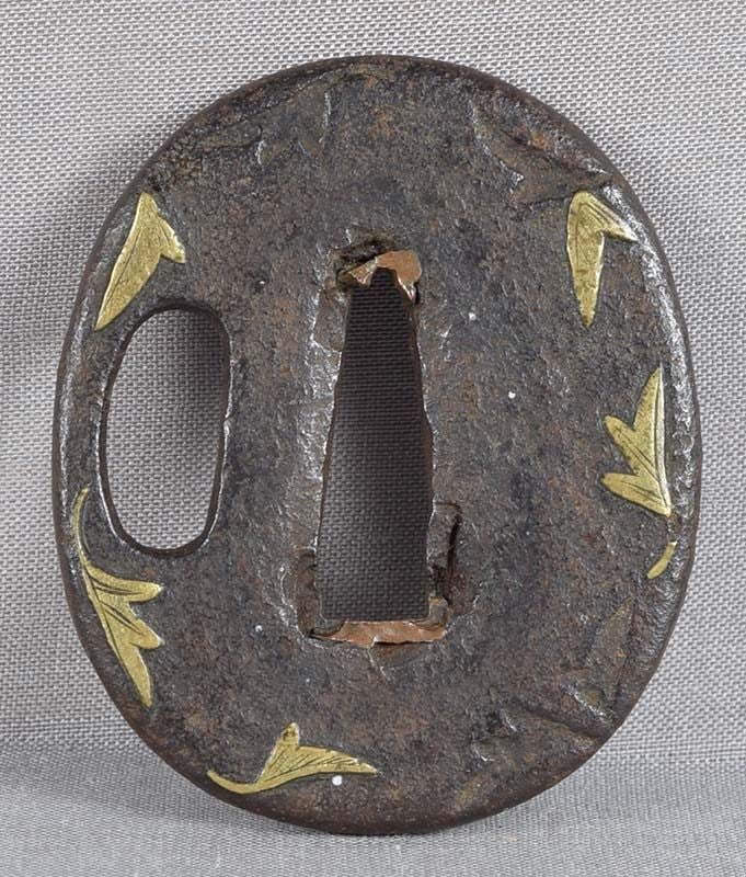 18c Japanese sword iron TANTO TSUBA autumn leaves: 18th century Japanese sword iron tanto tsuba with brass inlays of autumn leaves blown by the wind. Very good piece with gilding, precise detailing and overall mood of contemplation and melancholy.