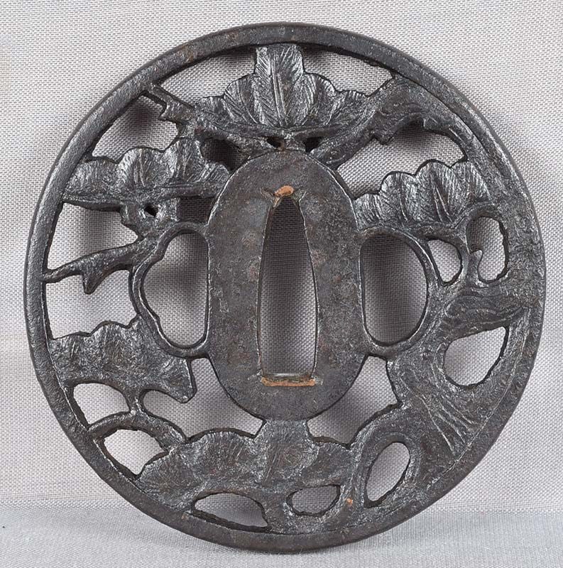 18c Japanese sword sukashi TSUBA PINE: 18th century or earlier iron sukashi Japanese sword tsuba with pierced decoration of gnarled pine trunk and needle clusters - Japanese symbol of good luck and longevity. Powerful design, overall in