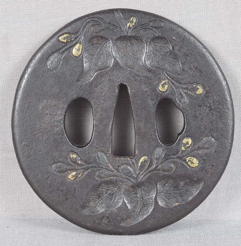 Large 18c Japanese sword TSUBA paulownia leaves & flowers: 18th century good size iron Japanese sword tsuba with decoration of paulownia leaves and flowers. Paulownia (kiri) is considered to be a Princess tree in Japan and was featured in the crest of the