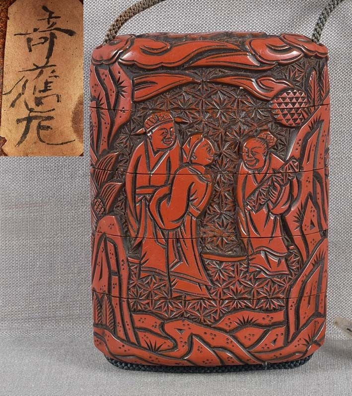 19c Japanese lacquer inro SCHOLARS by KIHAN: 19th century Japanese cinnabar lacquer 4-compartment inro carved with 2 scenes of Chinese scholars in conversation and with an attendant under a pine tree, the sides with rocks and plants, and top