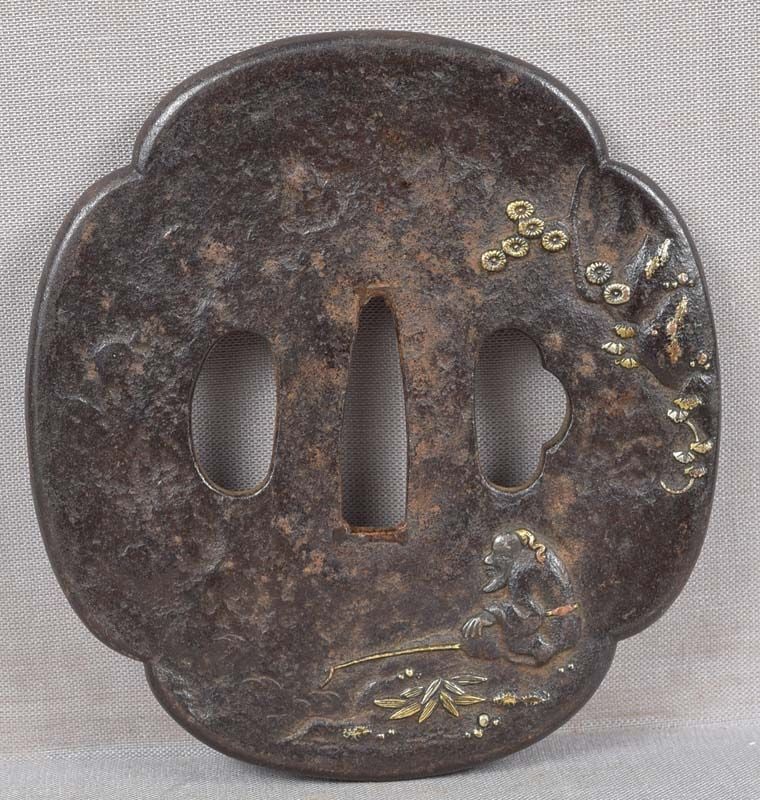 18c Japanese sword TSUBA SCHOLAR fishing: Late 18th to early 19th century iron Japanese sword tsuba depicting a scholar peacefully fishing by a stream under a rock with vines and pine growing on it, design continues on the back showing