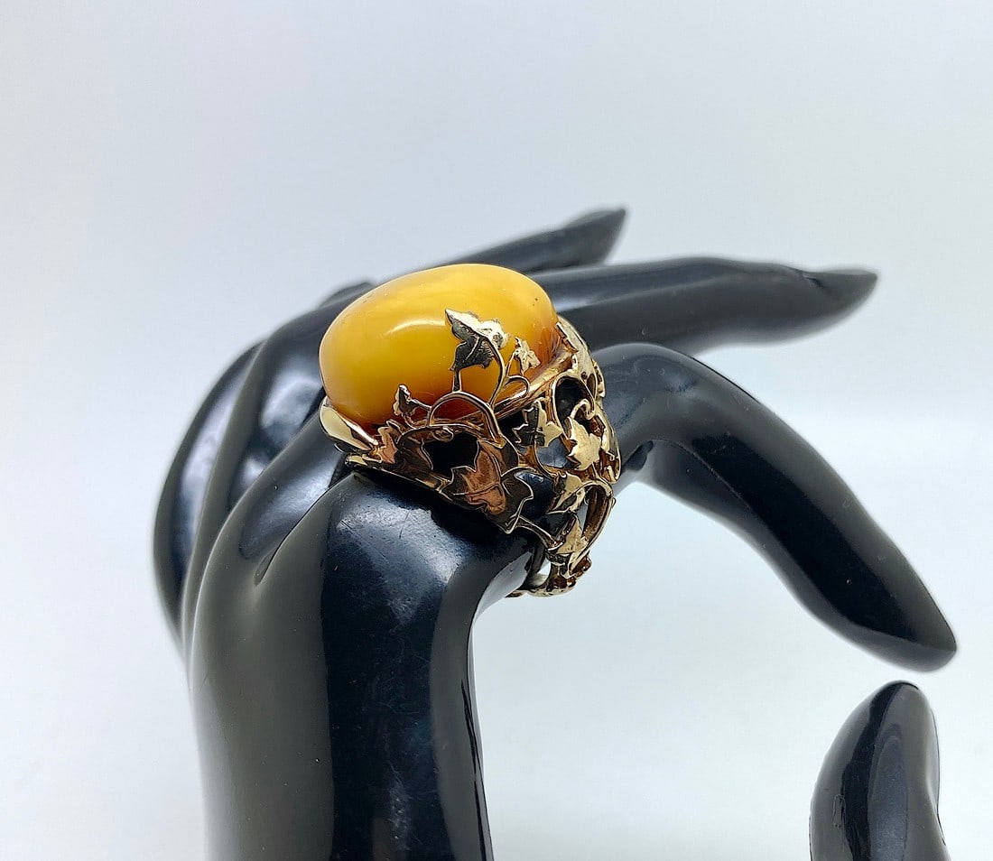 Unique and Adjustable Amber Ring: Title:Unique and Adjustable Amber Ring Metal:925 Silver-Gold Plated Gemstone:Amber Weight:12.0 g Size:Inner diameter: 26.0 x 24.0 mm Size: 32.0 x 26.0 x 8.25 mm Size: 1.26 x 1.024 x 0.325 inches Inner