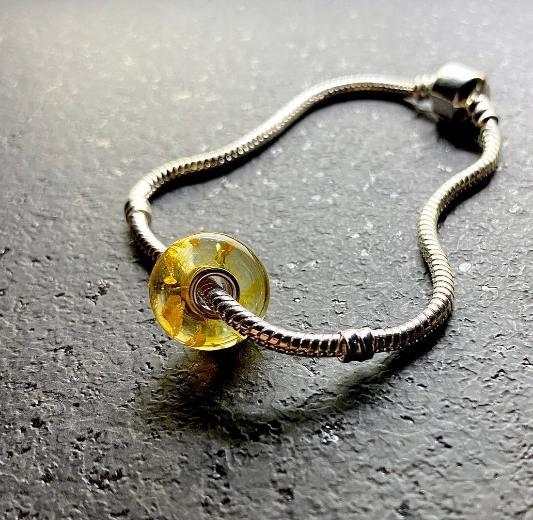 Unique and Grand Amber Bracelet made from Doughnut shaped Amber beads: Title:Unique and Grand Amber Bracelet made from Doughnut shaped Amber beadsMetal:Sterling SilverGemstone:AmberWeight:13.0 gSize:Size: 200.0 x 14.0 x 14.0 mm Size: 7.874 x 0.551 x 0.551 inches Bead