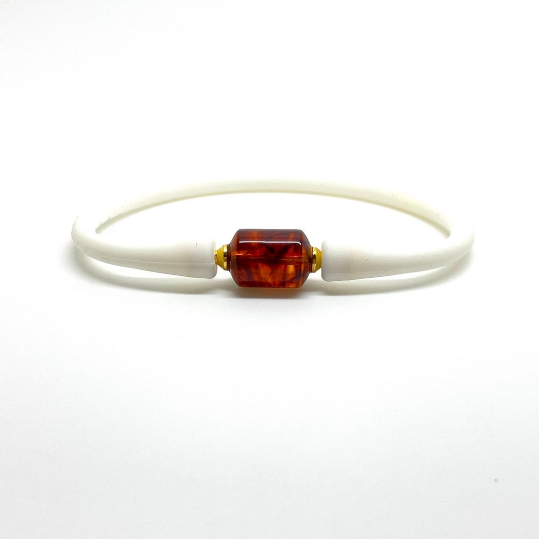 Extraordinary Amber Bracelet made from Doughnut shaped Amber bead: Title:Extraordinary Amber Bracelet made from Doughnut shaped Amber beadMetal:NoneGemstone:AmberWeight:4.0 gSize:Bead size: 9.0 x 12.0 mm Bead size: 0.354 x 0.472 inches Wrist length: 160.0 mmMade